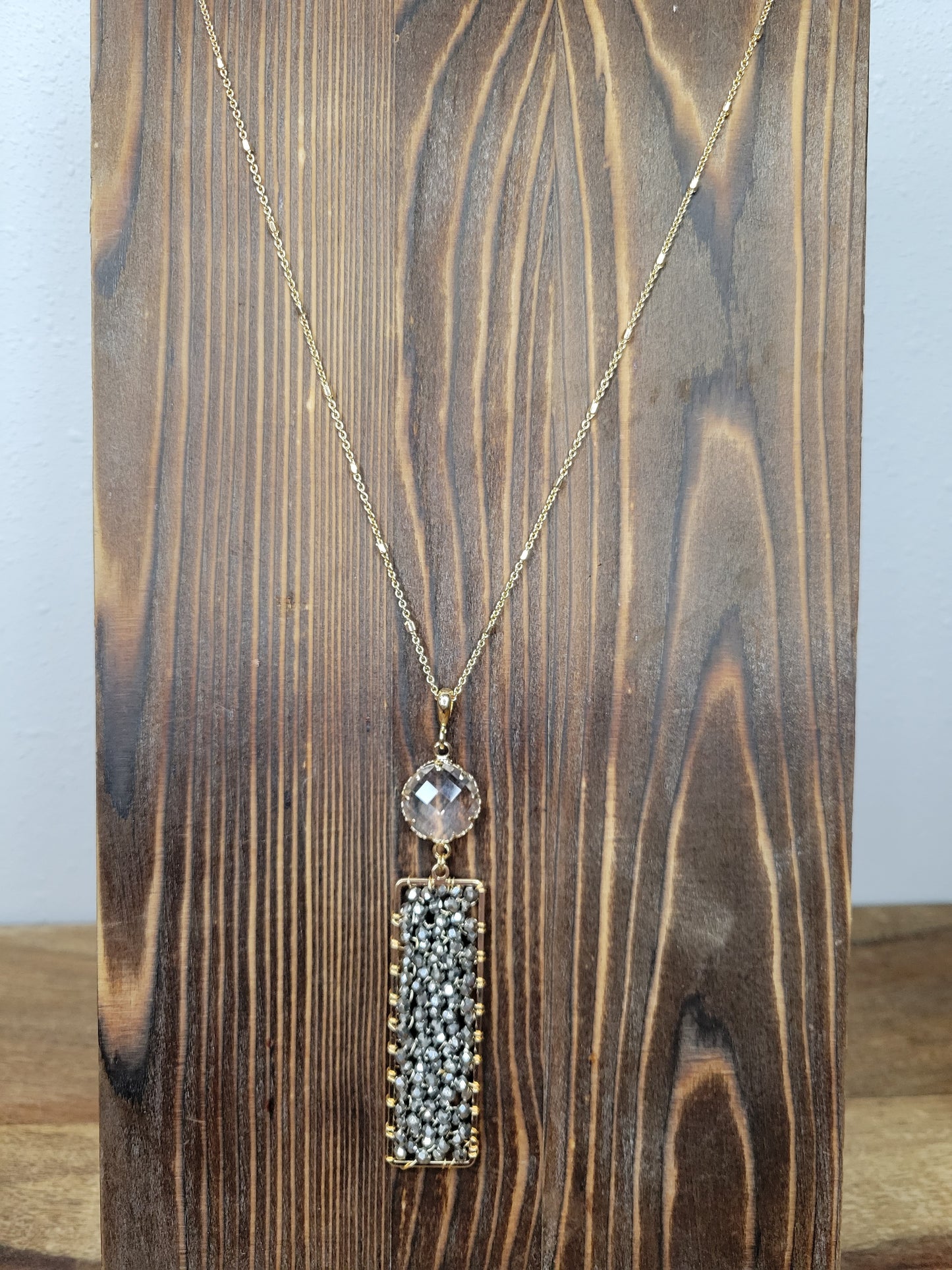Gold Chain with a Charcoal Beaded Rectangle Pendant