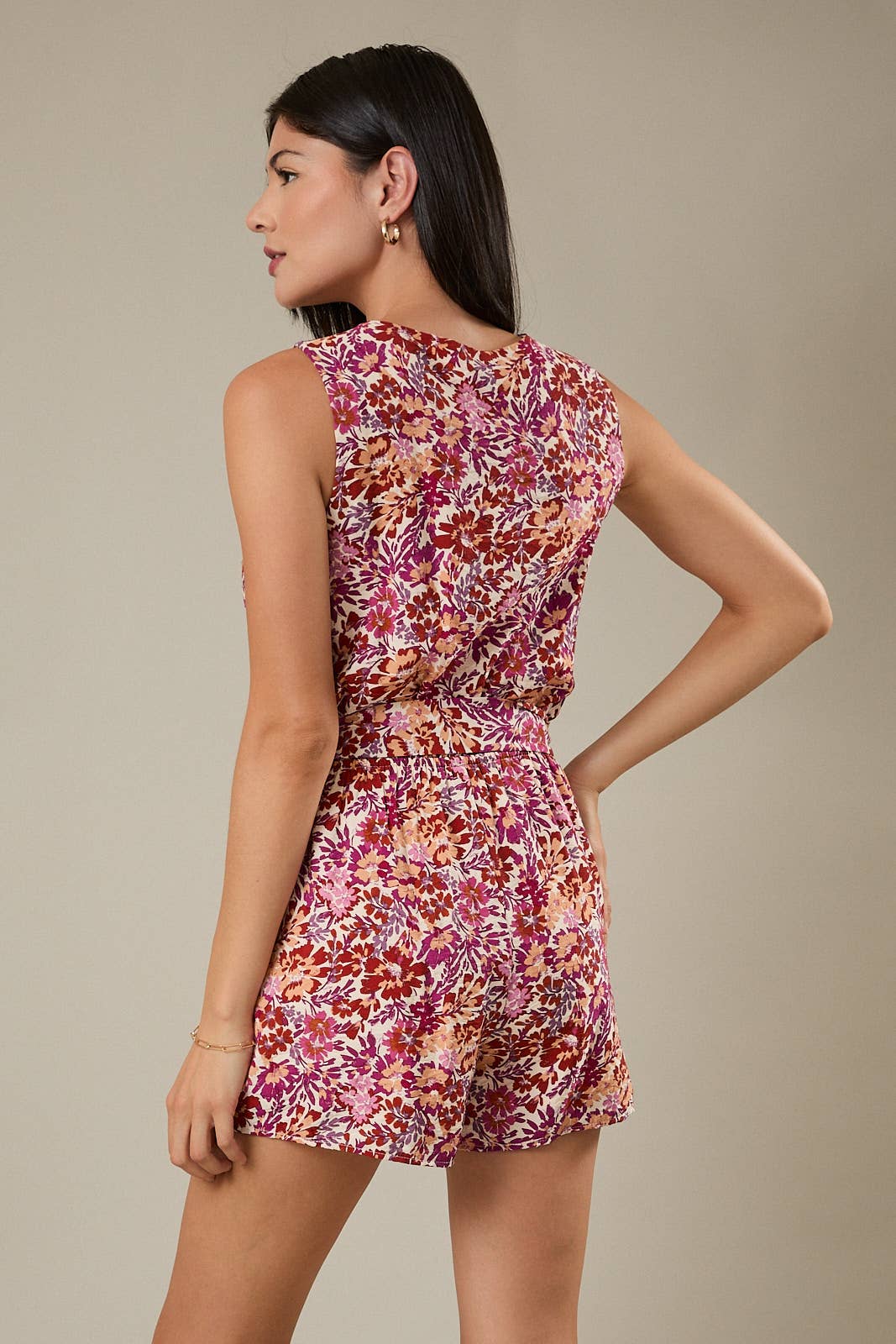 Gilli Sleeveless Surplice Waist Strap Floral Romper: Cream-Multi Floral