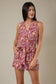 Gilli Sleeveless Surplice Waist Strap Floral Romper: Cream-Multi Floral