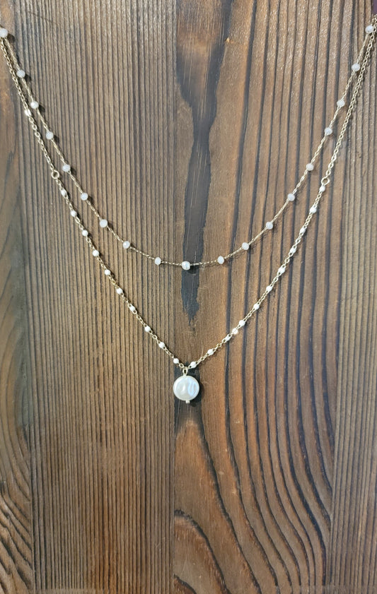 Coroner gold layered necklace